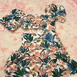 floral pattern with ruffles and puffed sleeves